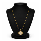 A gold-tone four-petal flower pendant necklace displayed on a black jewelry bust against a white background.