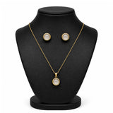 Gold jewelry set featuring a pendant necklace and matching stud earrings displayed on a black jewelry bust against a white background.
